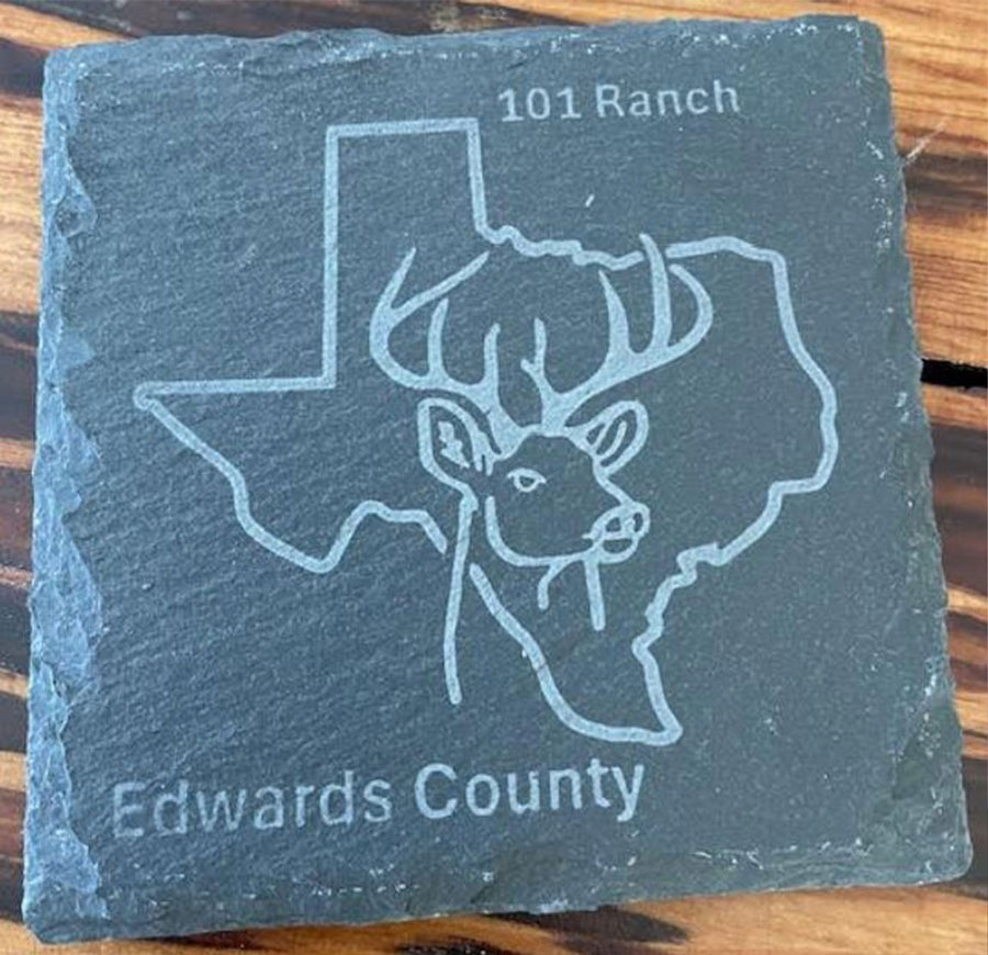Slate coaster engraved with the outline of Texas